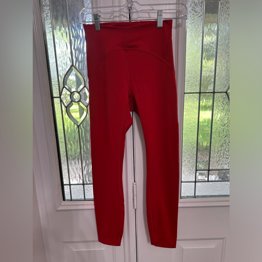 Lululemon Instill High-Rise Tight 25"
Dark Red size 4